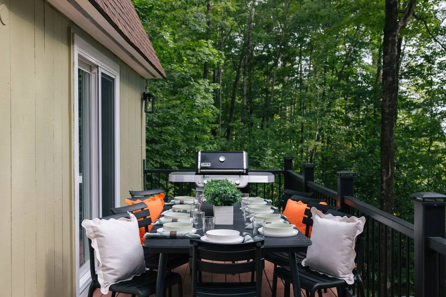 Outdoor dining and grill area at Peak and Pine Retreat Bartlett NH