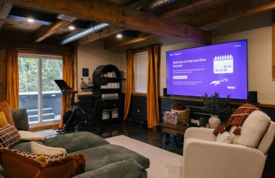 Bedroom with smart TV and mountain views at Peak and Pine Retreat