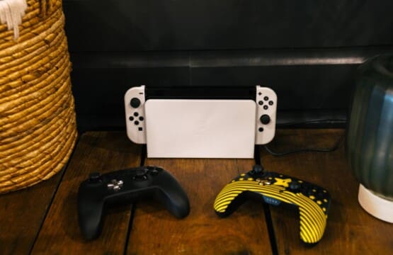 Nintendo Switch gaming console with controllers for guests at Peak and Pine Retreat