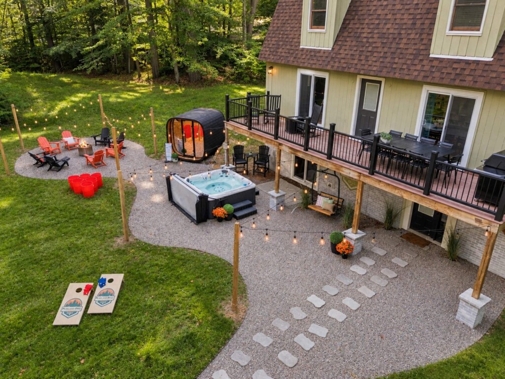 Overhead view of deck, hot tub, sauna and fire pit at Peak & Pine Retreat