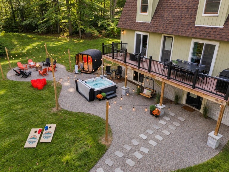 Overhead view of deck, hot tub, sauna and fire pit at Peak & Pine Retreat