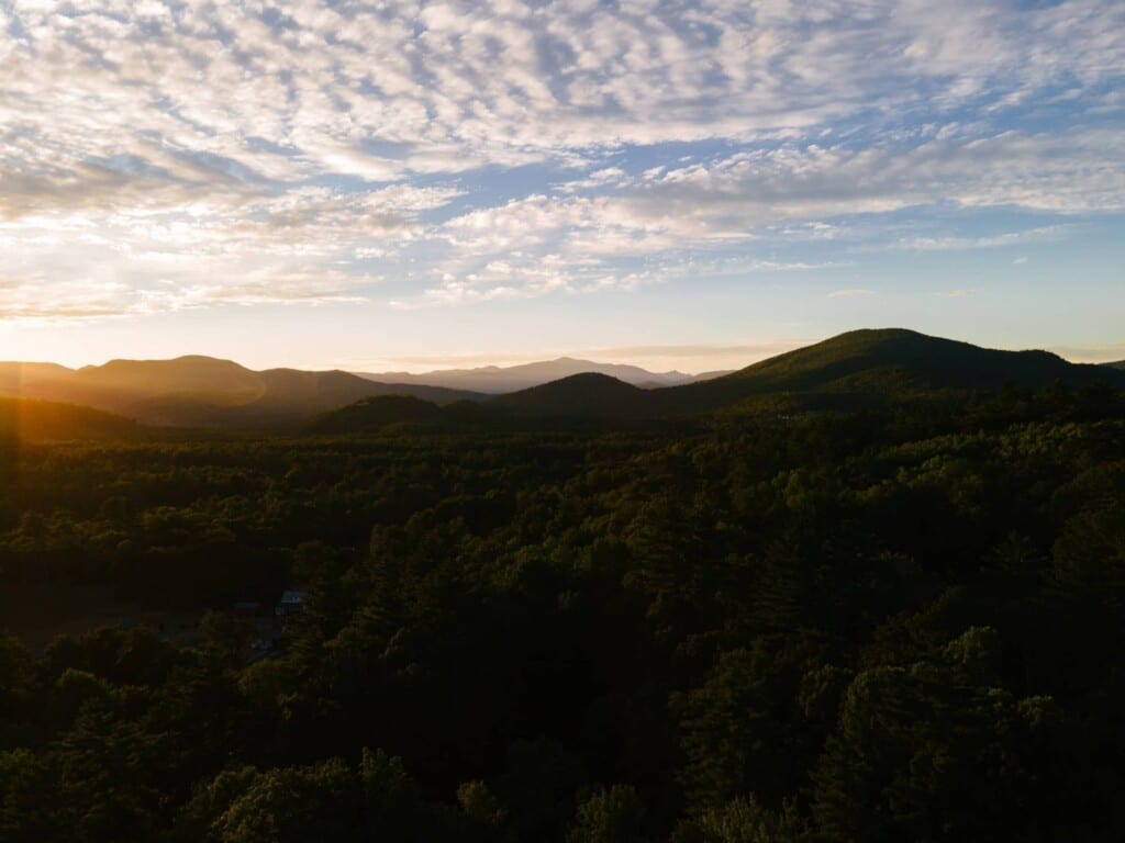 Sunset over the forested White Mountains near North Conway NH